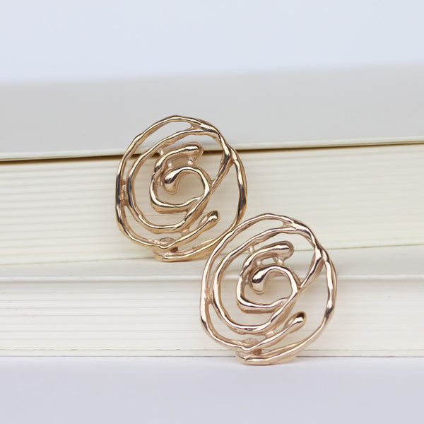 Orecchini Vortice in bronzo, a lobo con perno.