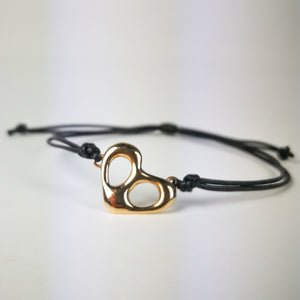 Braccialetto Cuore mini in bronzo, con cordino.