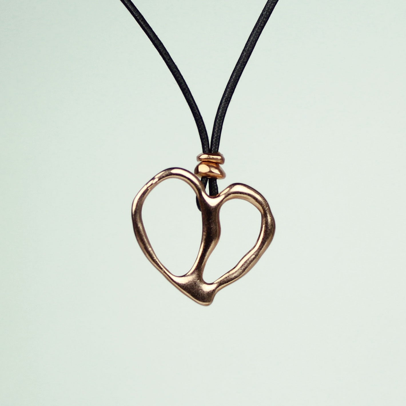 Ciondolo Cuore medio in bronzo.